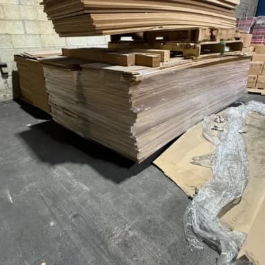 Wrapped stacks of MDF boards in a warehouse