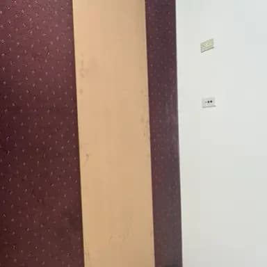 MDF board shown upright to demonstrate its width and finish