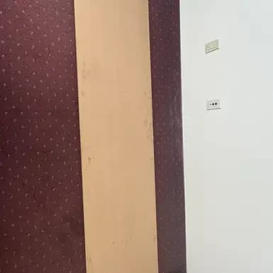 MDF board shown upright to demonstrate its width and finish